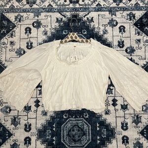Free people new with tags peasant top.